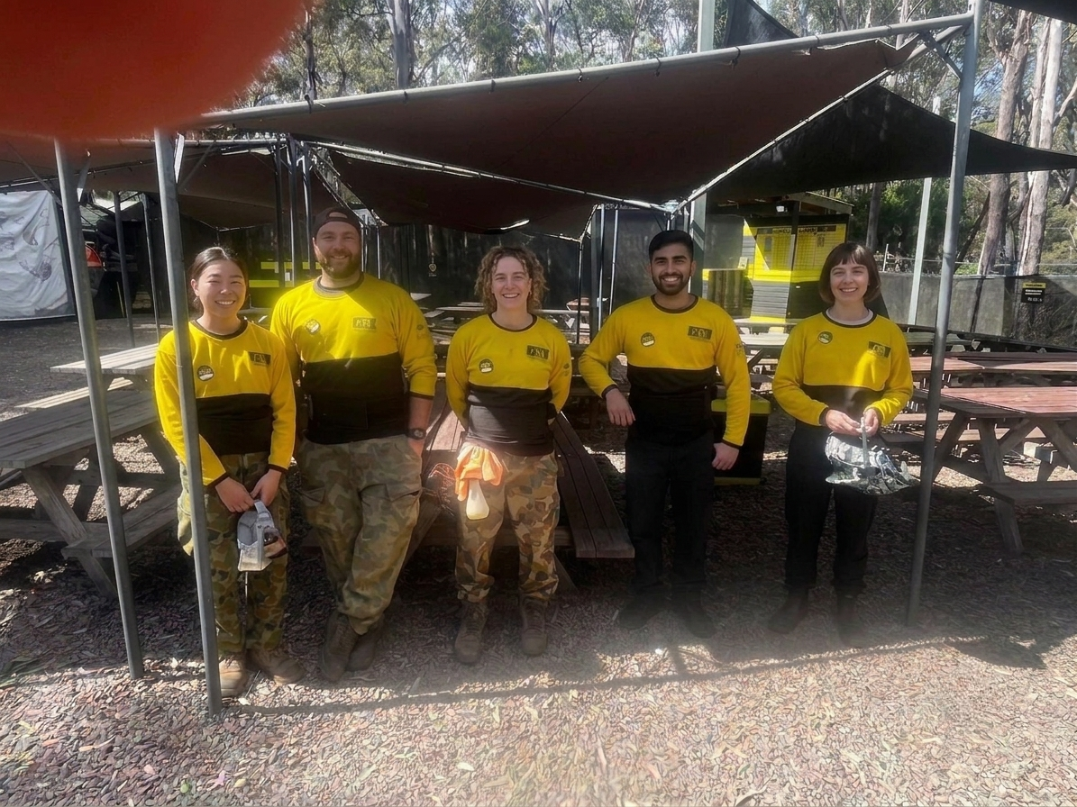 A team of Delta Force marshals wearing yellow uniforms